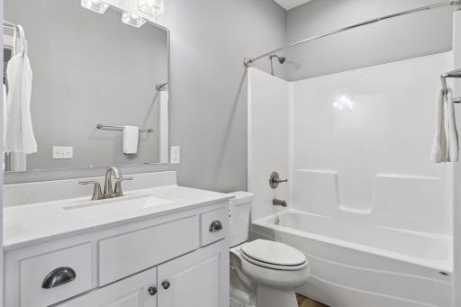 Main level full bath is conveniently located across the hall from the 2nd Bedroom/Office.