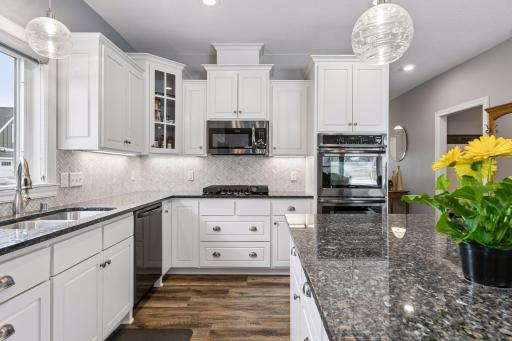 Lots of counter and cupboard space. Really a great kitchen to entertain in.