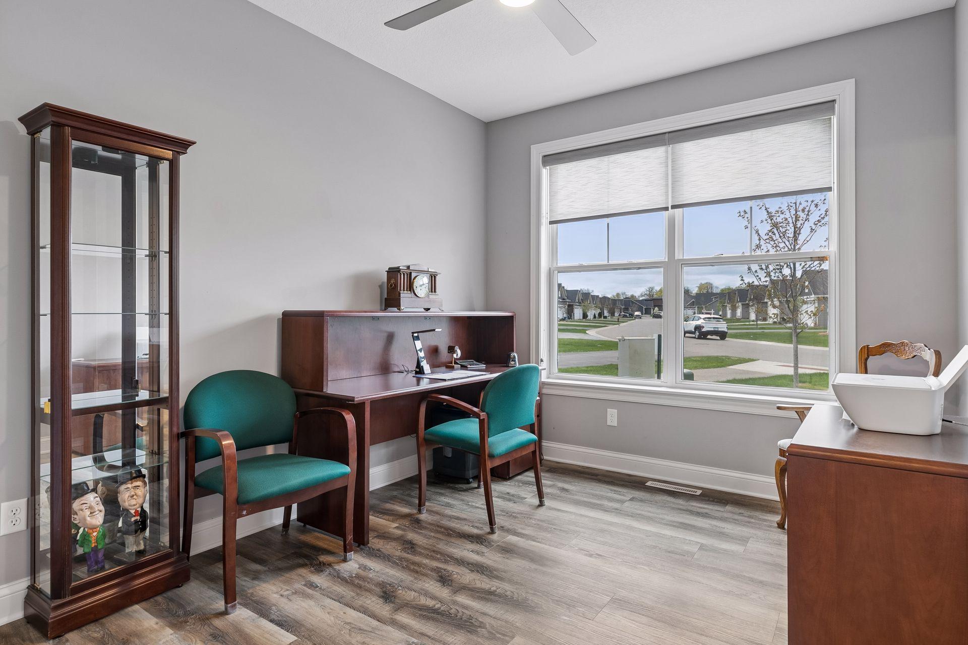 2nd Bedroom/Office has generous closet. The window has a film installed that reduces the intensity of the sun and makes this room enjoyable all day long. Nice custom roller shade too.