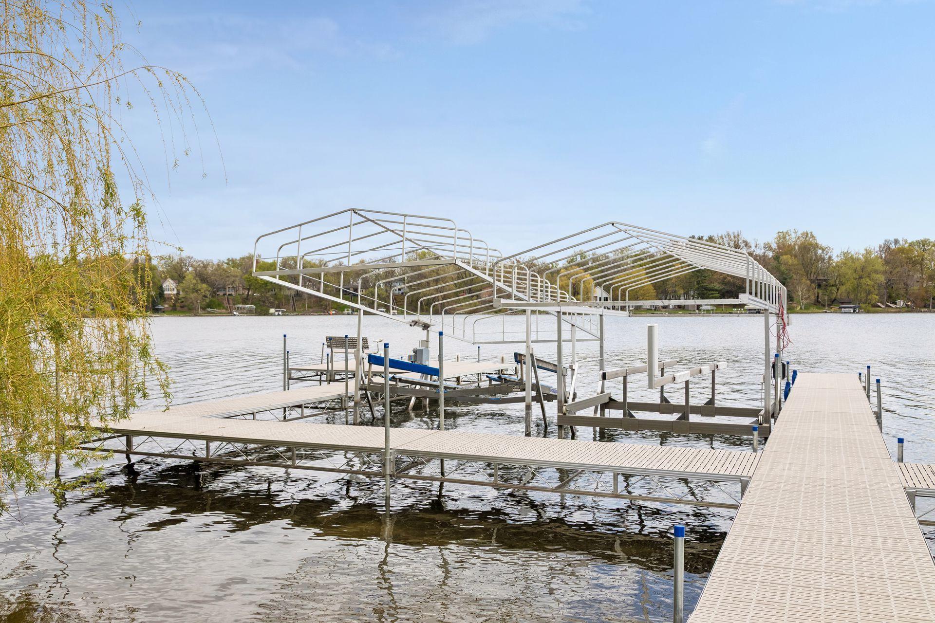 Boat slip is on the left. Pontoon lift is not included with the sale of home.
