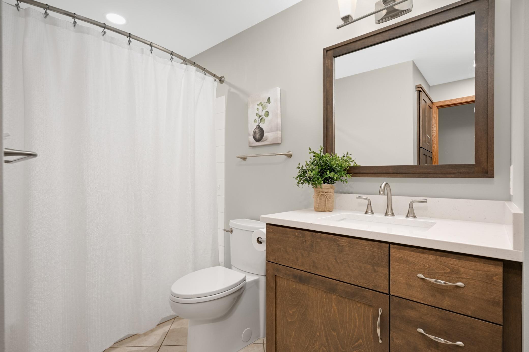 Upgraded Main Level full bathroom.