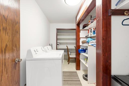 Main floor laundry room + great storage space