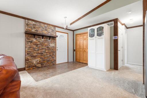 This is another access point to the exterior patio. Easy access to the full bath on the main level for lake guests!
