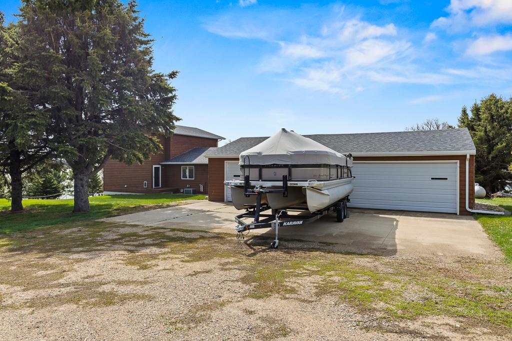 3 stall detached garage and nice parking space!