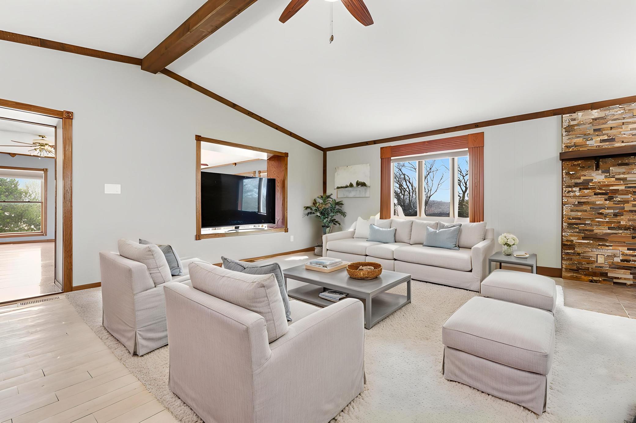 VIRTUALLY STAGED! This is a great idea as to how you can utilize and set up this informal secondary living space that is open to the kitchen and dining area!