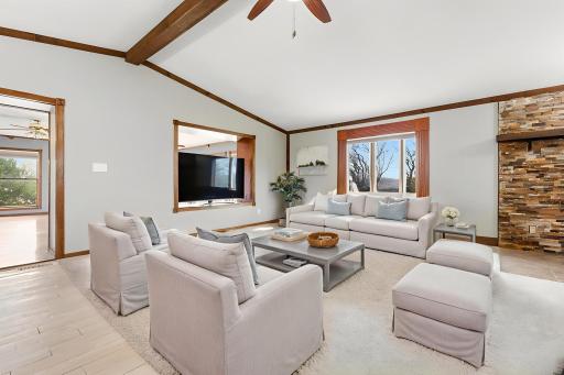 VIRTUALLY STAGED! This is a great idea as to how you can utilize and set up this informal secondary living space that is open to the kitchen and dining area!