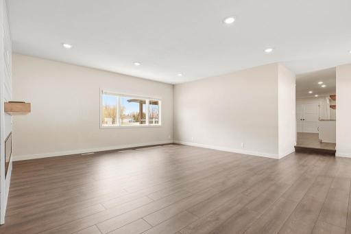 This space still has an open concept feel to the kitchen/dining yet it has just enough separation for you to host multiple groups of people or simply to relax and have a more quiet space.