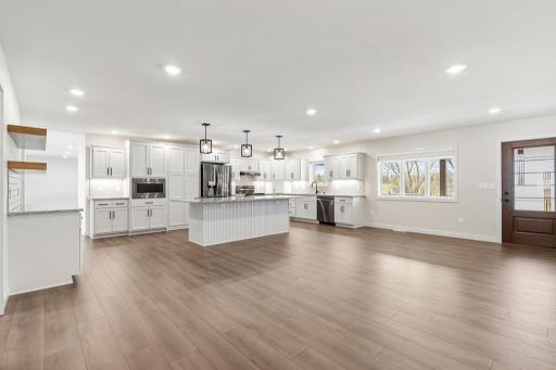 Wonderful space for a large dining room + 5 or more island stools!