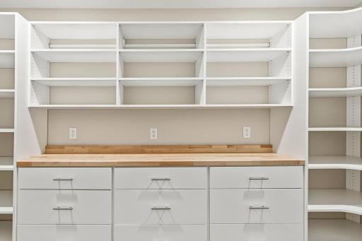 This hidden pantry is an absolute delight with space galore for all of your necessities!