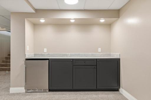 Nicely designed mini bar in the lower level! Great space to do a billards room, have a ping pong table, or maybe just another spot to relax.