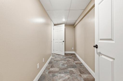 Nicely sized storage room! Additional space to be used for your needs. Hunting room? Craft room? Canning space? You name it!