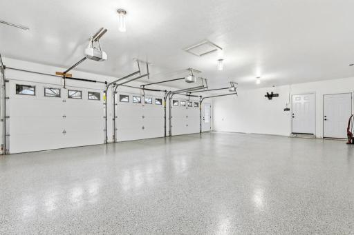 This garage is a delight! Fully finished, insulated, heated, epoxy floors, midland garage doors, you name it!