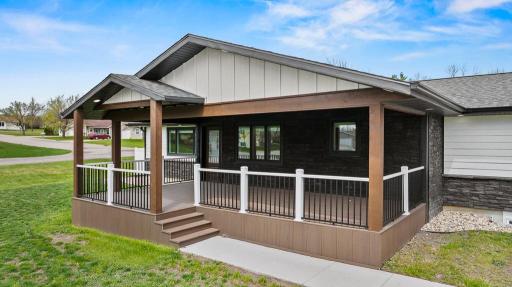 Imagine enjoying the sunrise and hosting some friends on this covered patio! Great space to enjoy the summer season and welcome guests to your front door.