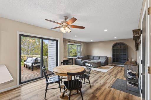 All new LVP flooring! Walk out to the updated deck and fenced in backyard!