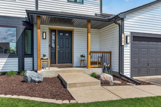 Cute porch on the front for a couple chairs or decorations!