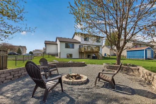 Enjoy the patio area with firepit and accent lighting!