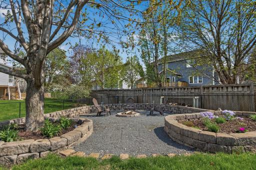 Enjoy the patio area with firepit and accent lighting!