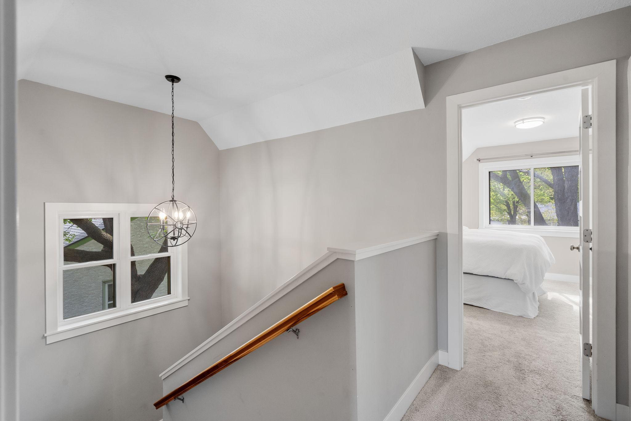 Head upstairs for 2 spacious bedrooms, a full bathroom, and laundry