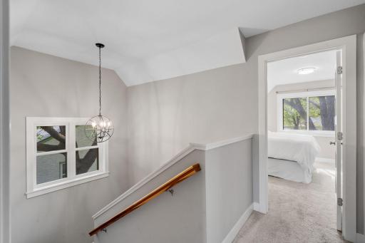 Head upstairs for 2 spacious bedrooms, a full bathroom, and laundry