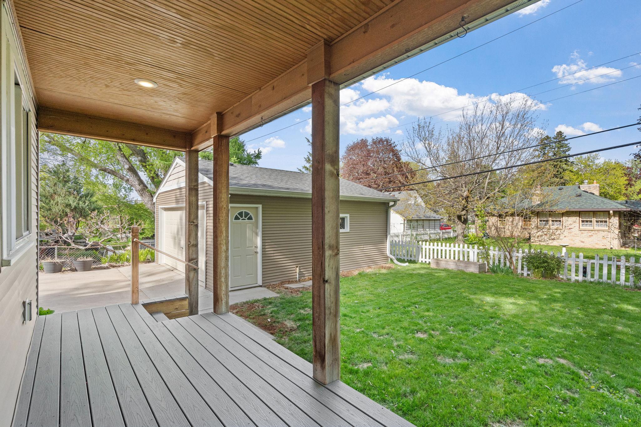 Partially fenced yard with easy access to your detached, 2-car garage