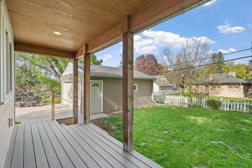 Partially fenced yard with easy access to your detached, 2-car garage