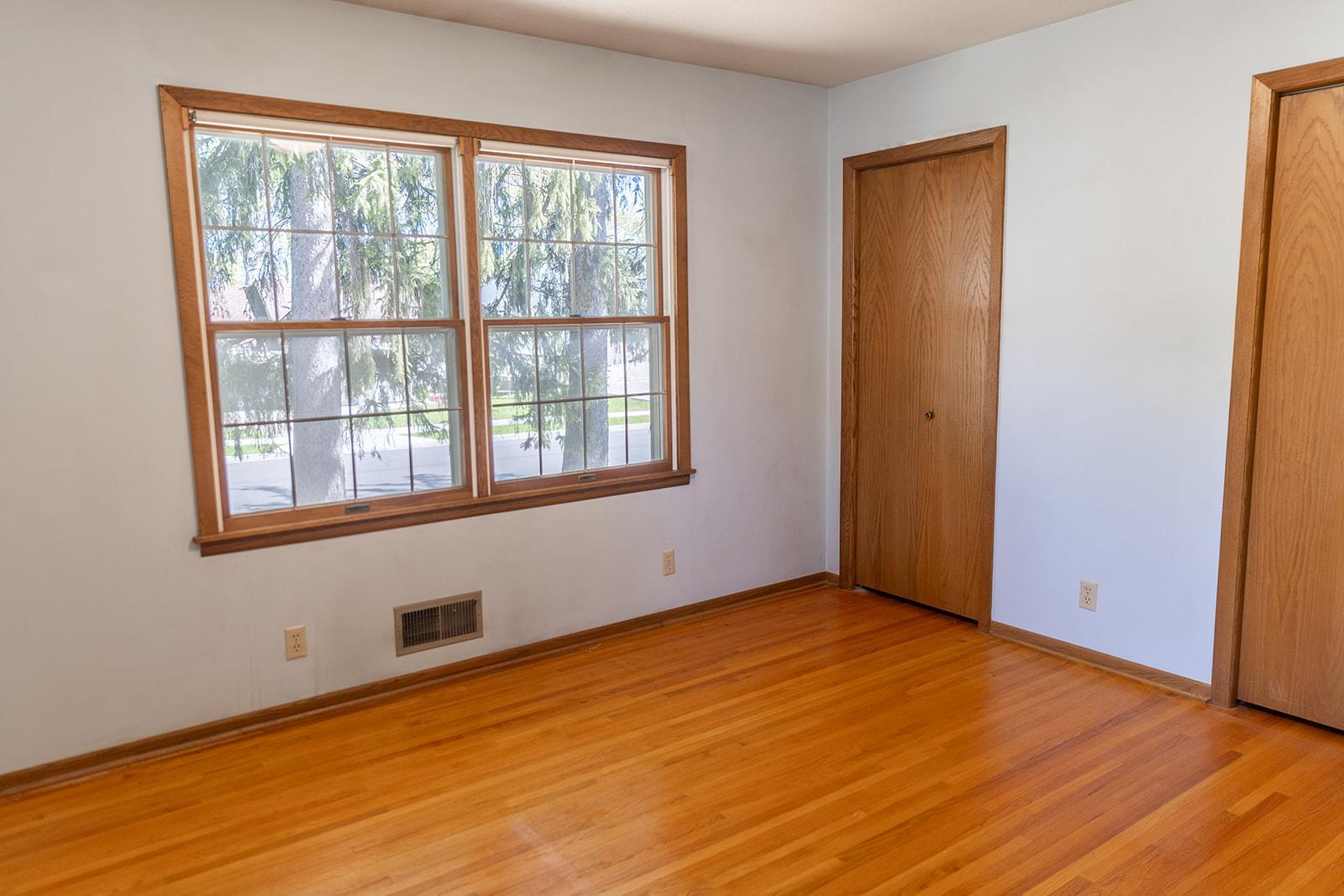 Main-level Bedroom features hardwood floors in excellent condition!