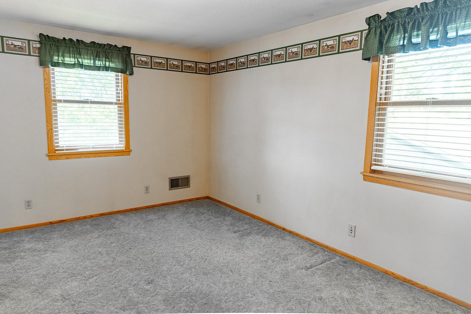 Another one of the 3 upper-level Bedrooms