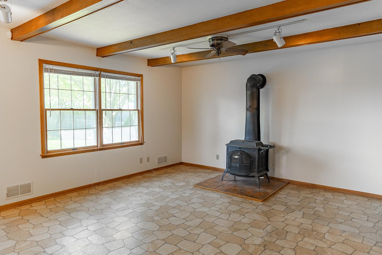 Wood-burning Stove in Family Room provides supplemental heat