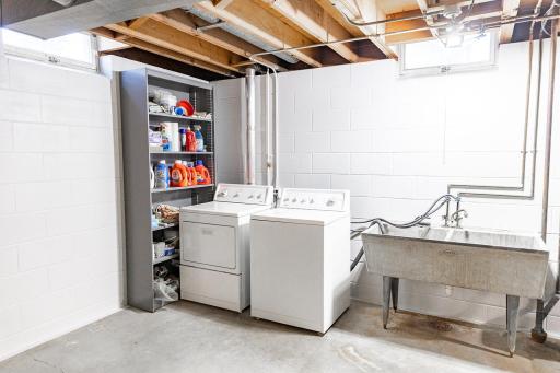 Clean and bright Laundry Area in basement