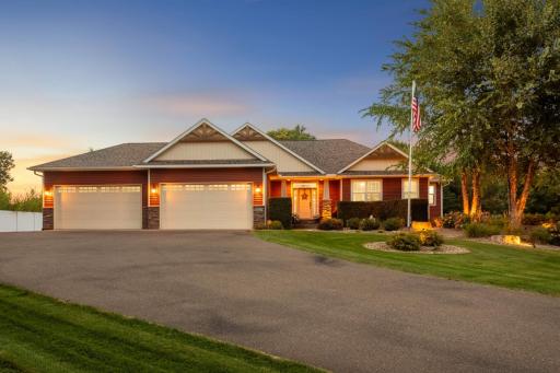 Stunning curb appeal with mature trees, manicured landscaping, and a welcoming exterior that immediately feels like home.