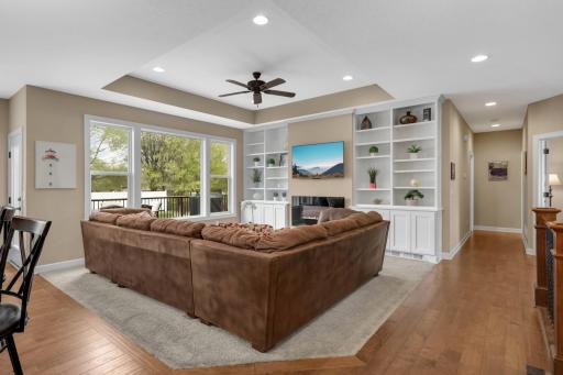 Bright and spacious living room filled with natural light, creating the perfect setting for relaxing or gathering with family and friends.