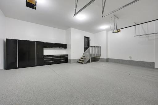 Professionally Finished Garage with Shelving/Storage and Epoxy Floors