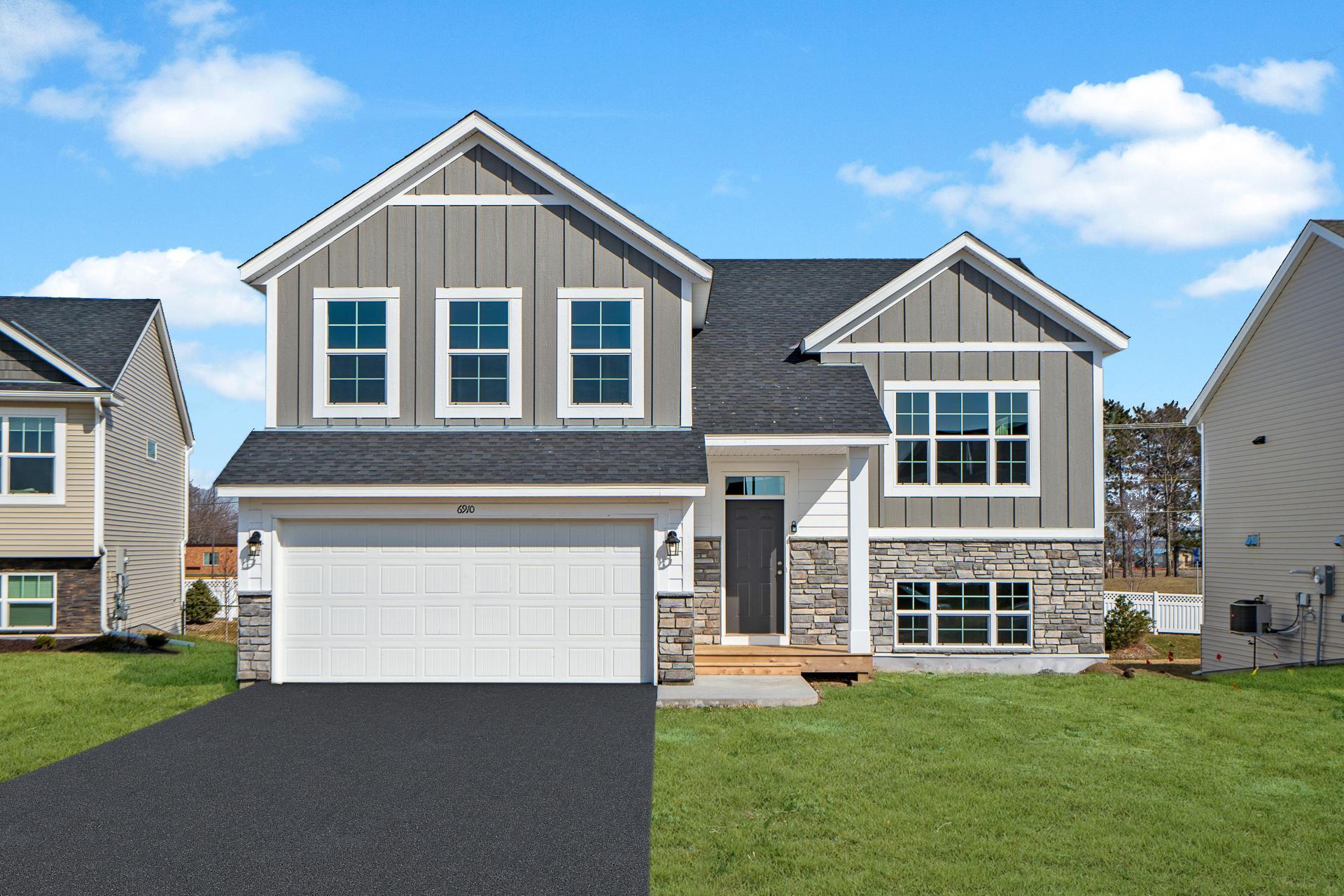 Photos are of a like home in different location. Options may be different in actual home. Actual home has no stone on the front.