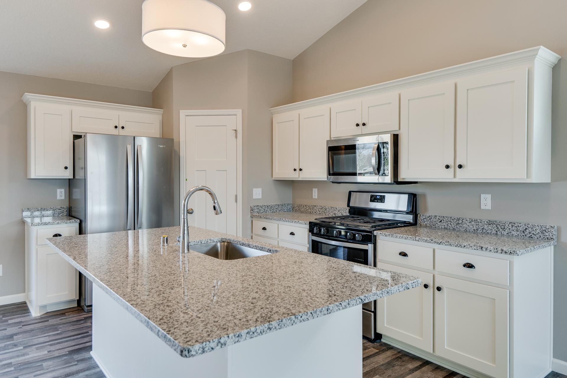 Photos are of a like home in different location. Options may be different in actual home.