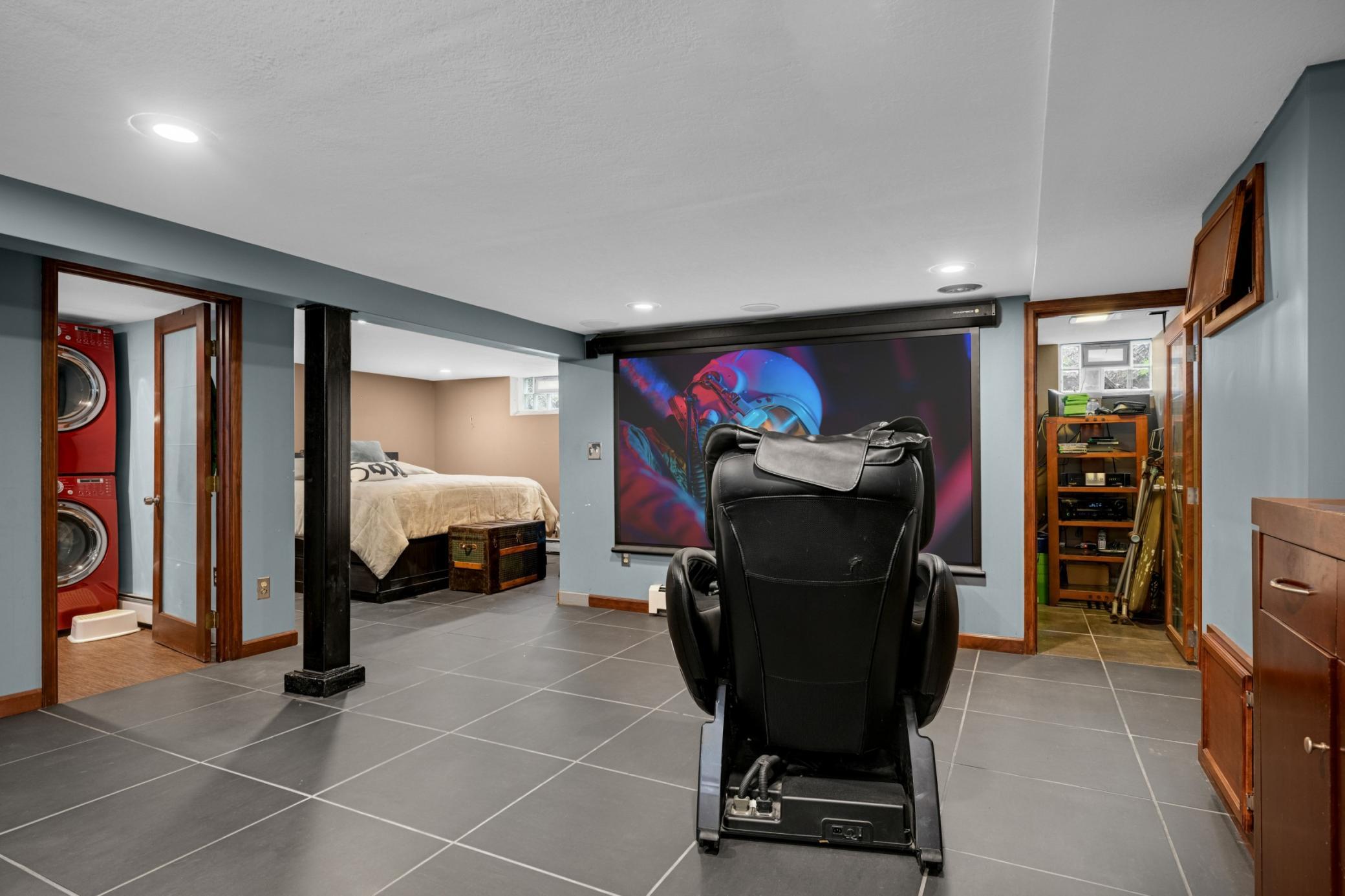 Lower level has heated floors and is already a great theater space