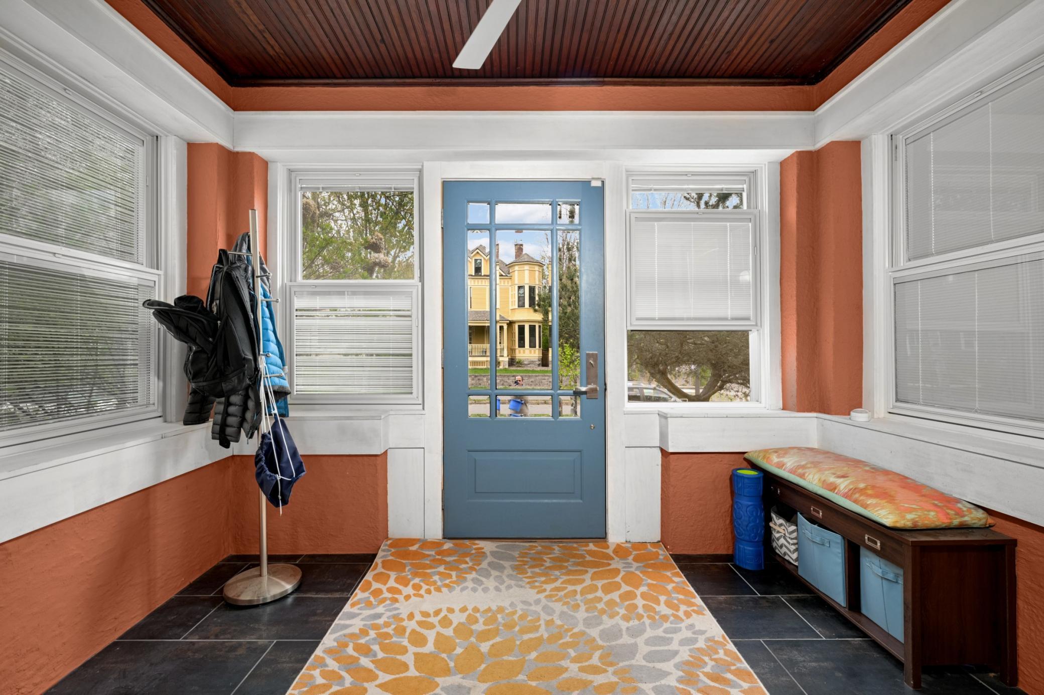 Front entry is a 4 season porch with heated floors and high-end windows.