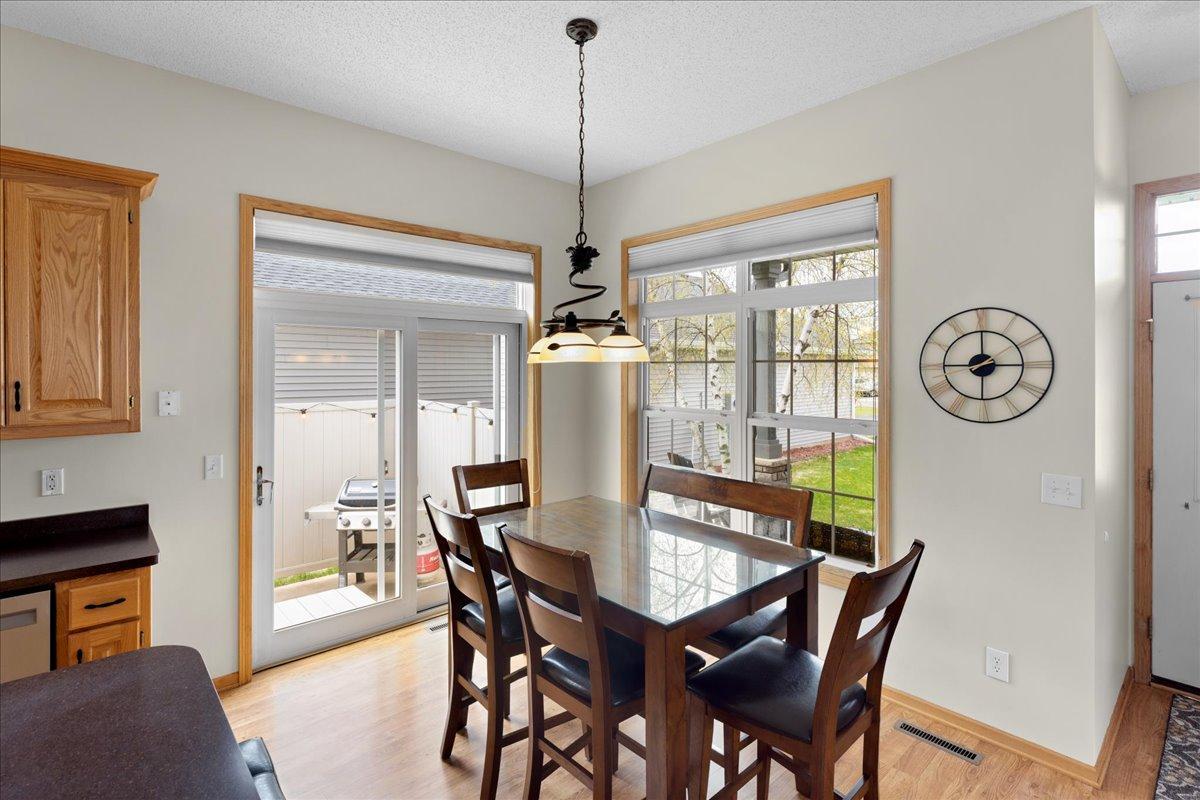 Convenient walkout to patio for easy grilling & chilling.