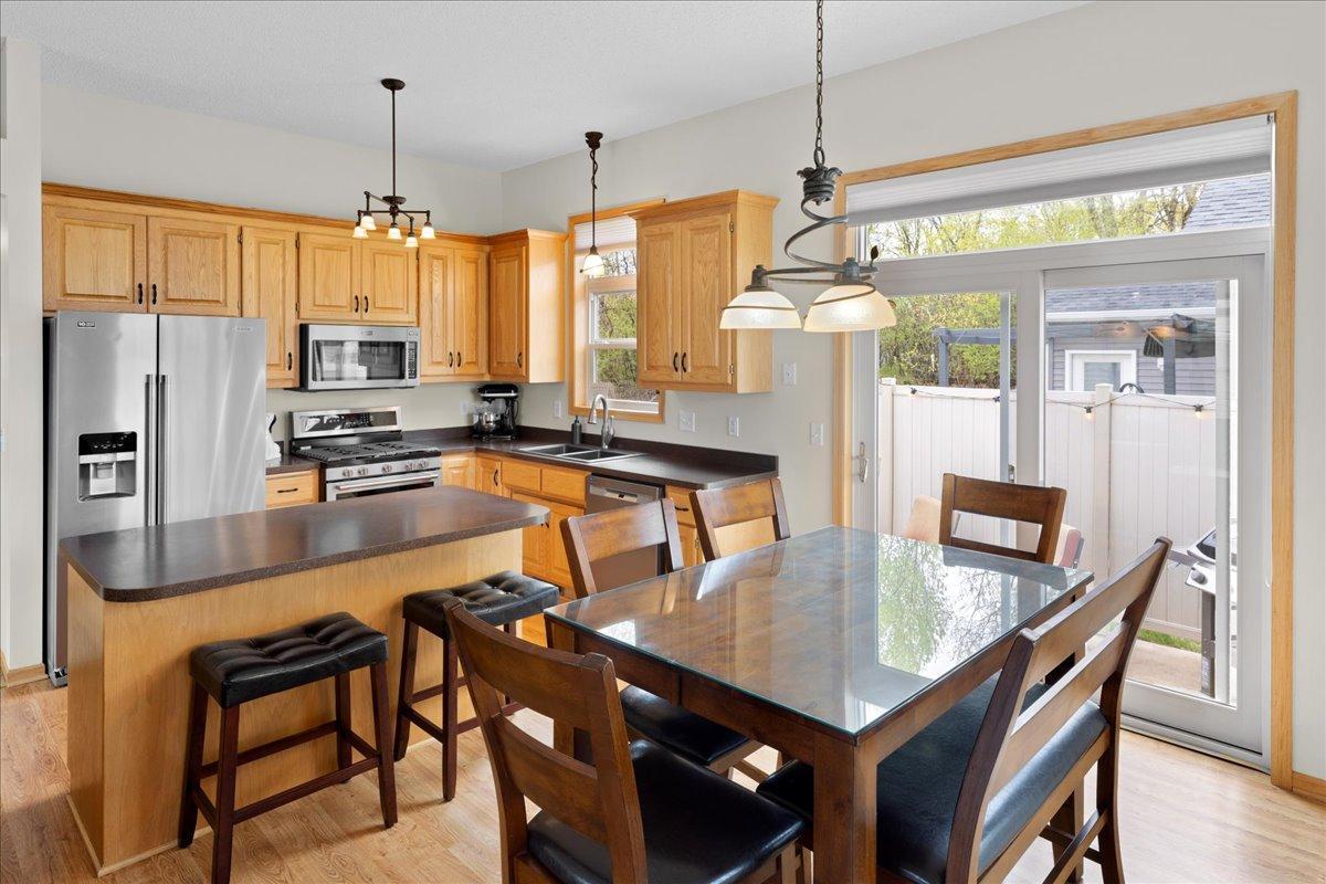 The heart of the home is the kitchen with a center island and walkout to patio
