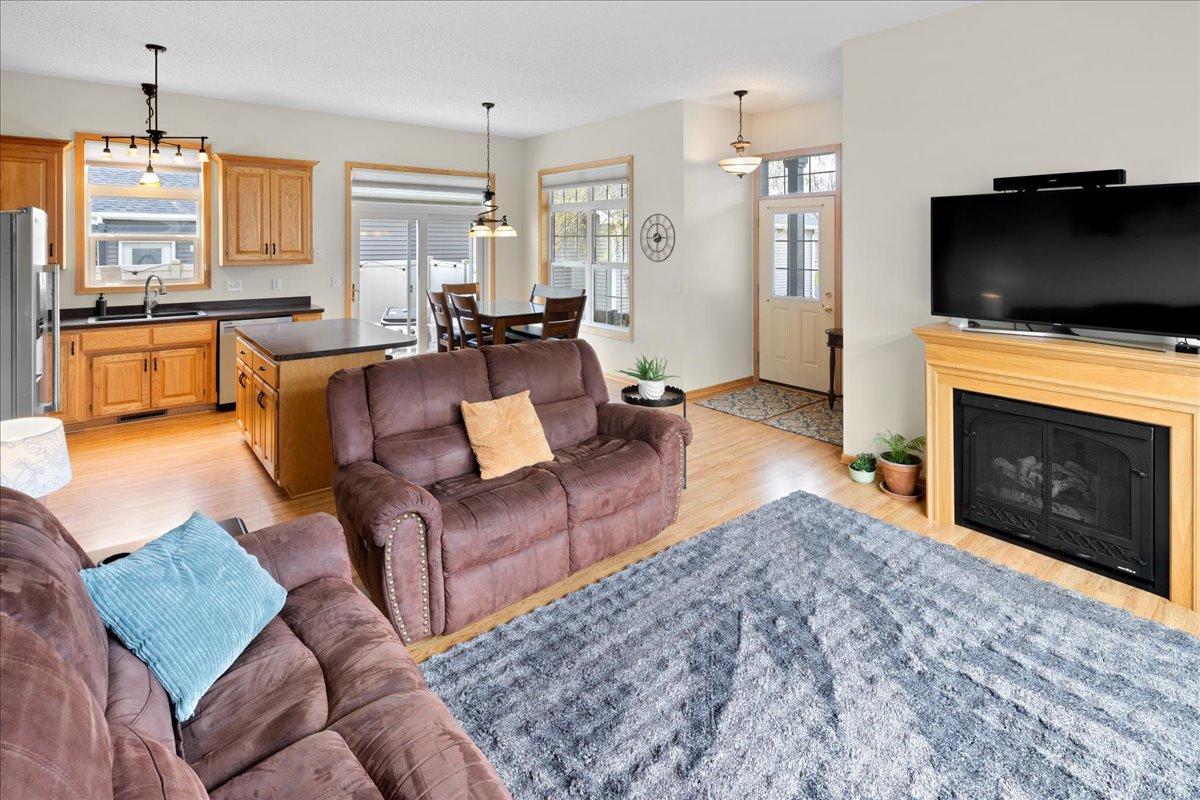 You'll love the 10' ceilings and the transom windows. ( freestanding electric fireplace )