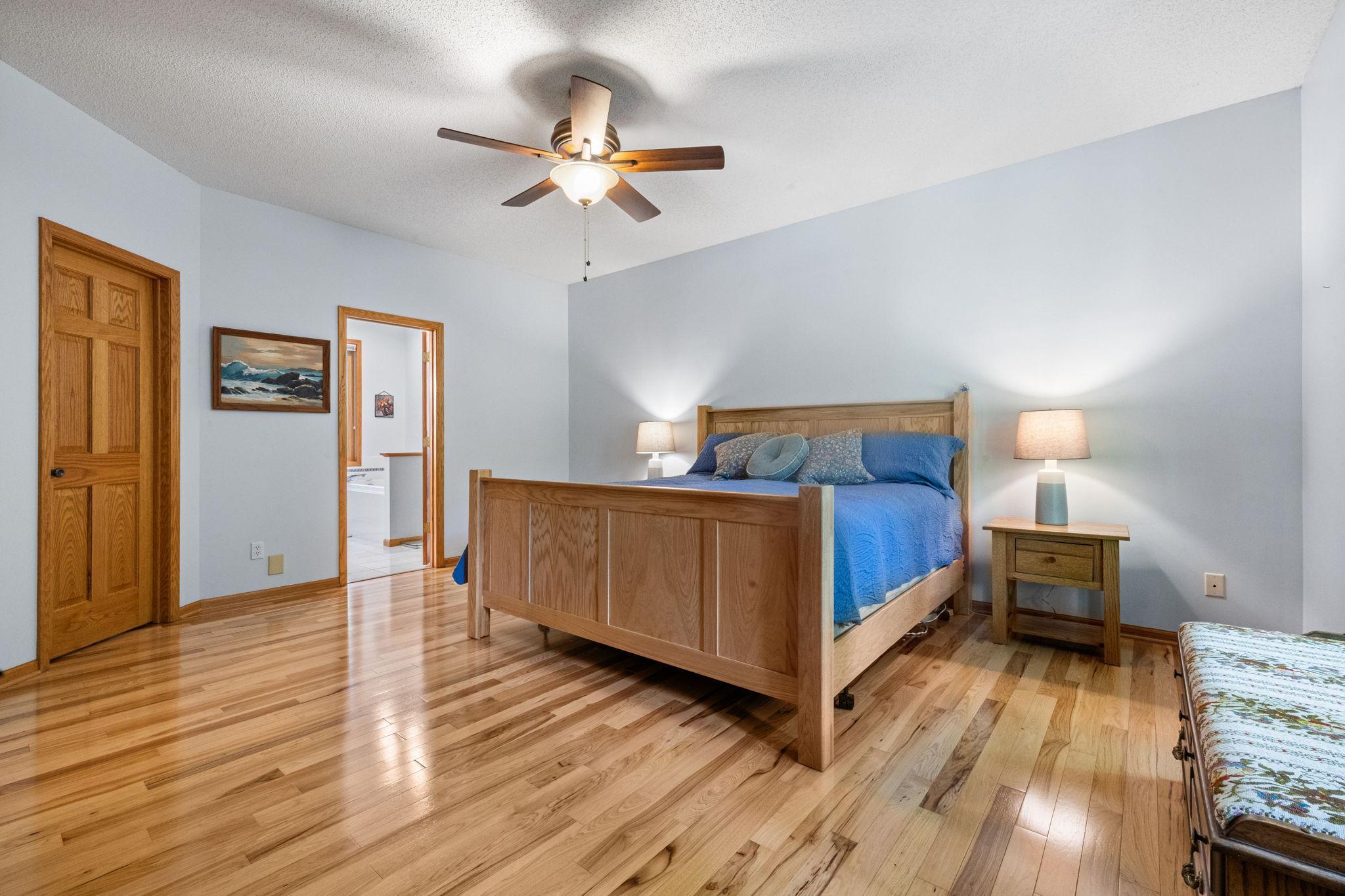 spacious primary bedroom suite