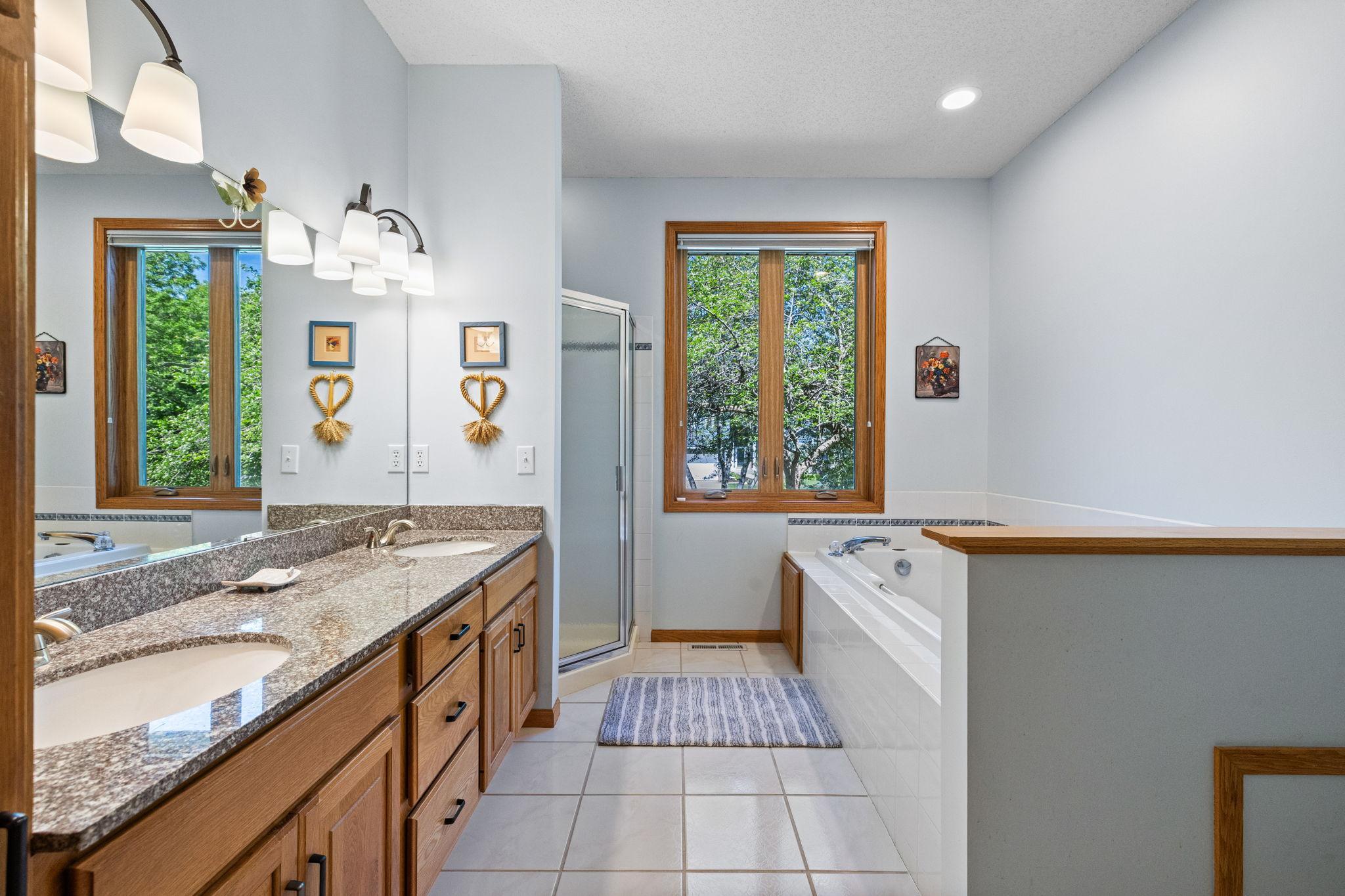 double sinks, separate jetted tub and shower