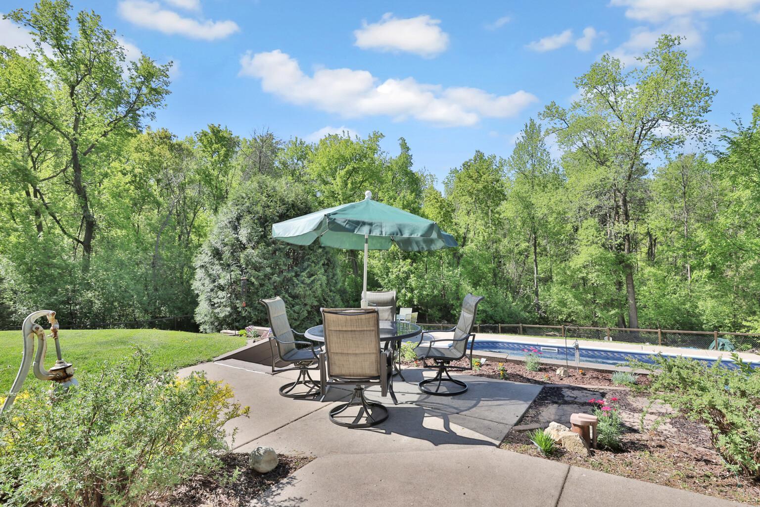An amazing back yard comes to life with the pool and surrounding wildlife