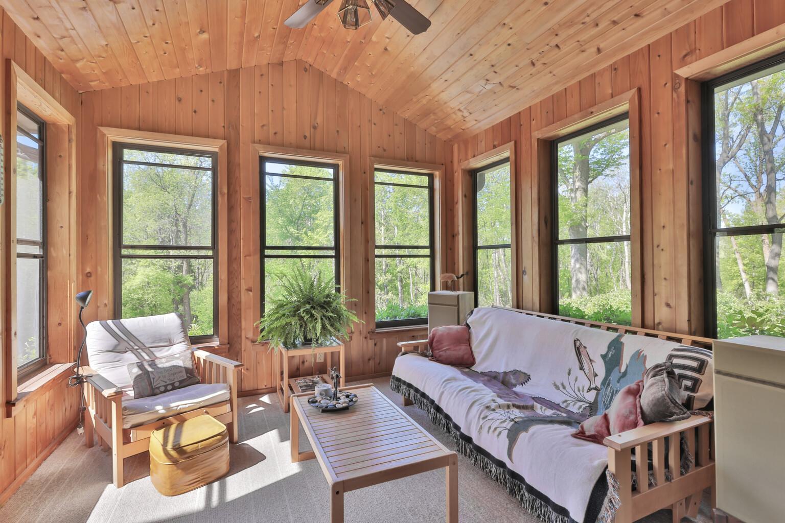 3 Season porch extends the home into the backyard making it more enjoyable