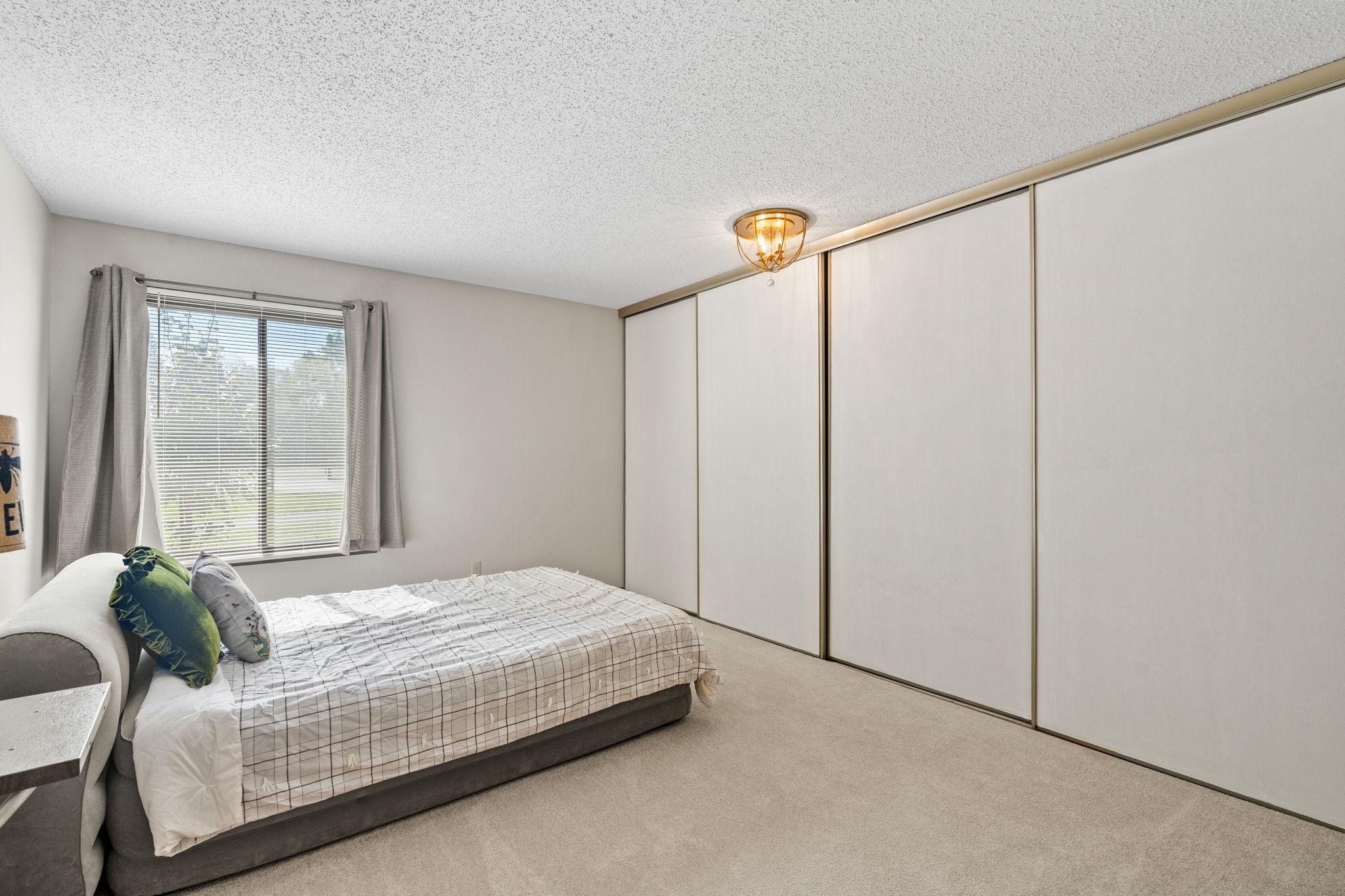 1164 Xene Ln N primary bedroom with storage