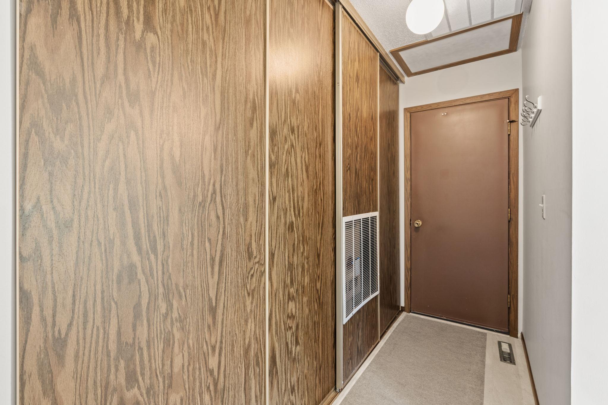 1164 Xene Ln N hallway to garage - Utilities