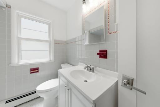 Main Floor full bath with original tilework