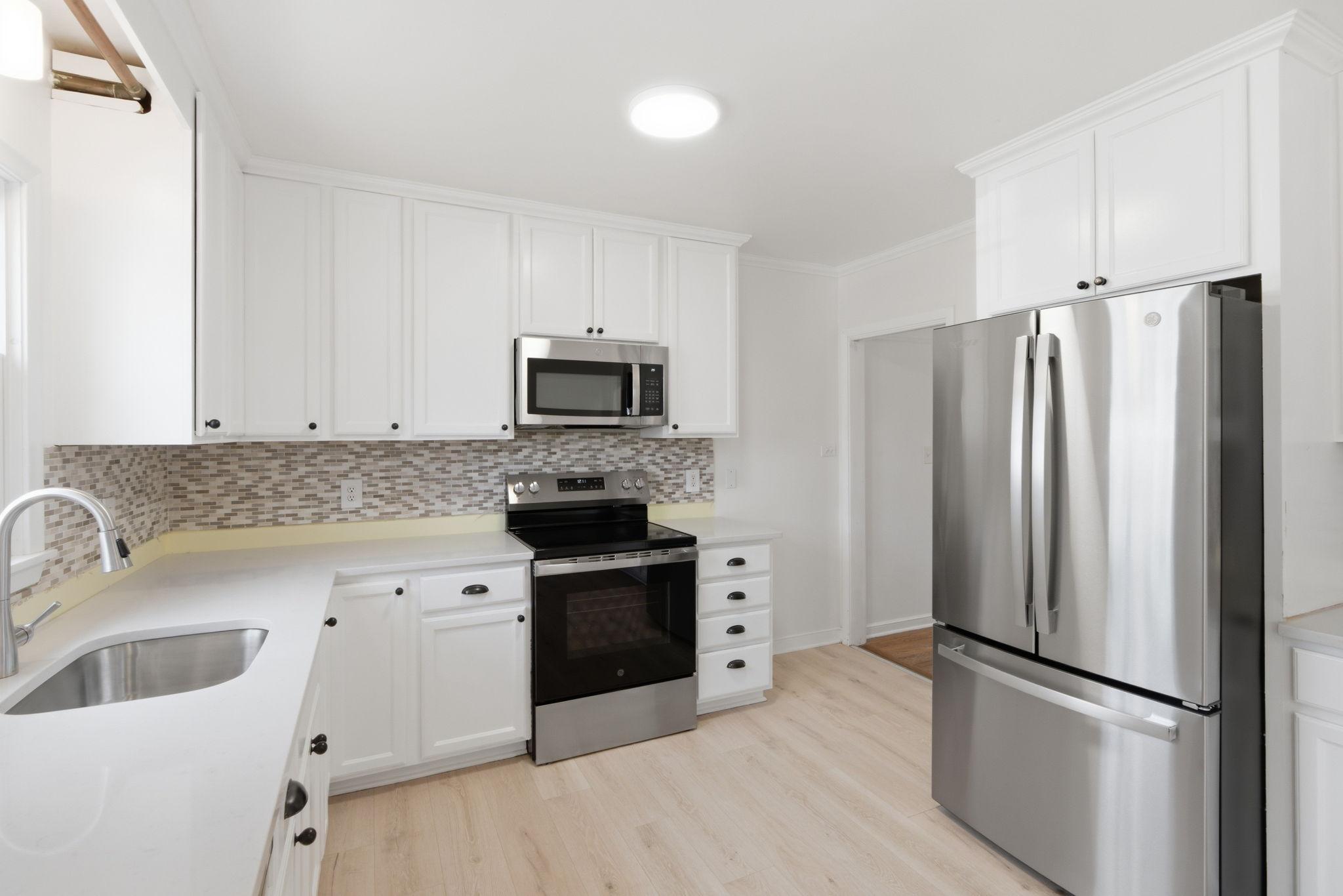 Updated kitchen, new backsplash coming