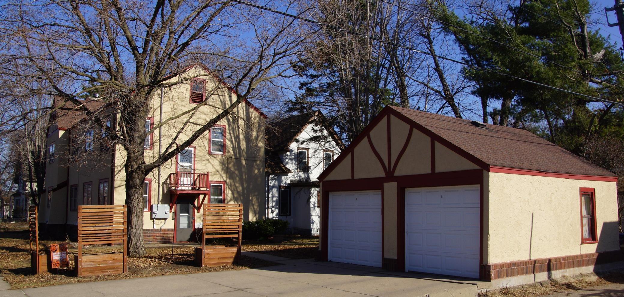 Garage and Back yard. Each unit gets 1 stall. Garage door opener on each door.