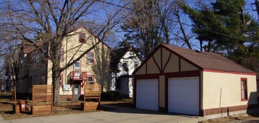 Garage and Back yard. Each unit gets 1 stall. Garage door opener on each door.