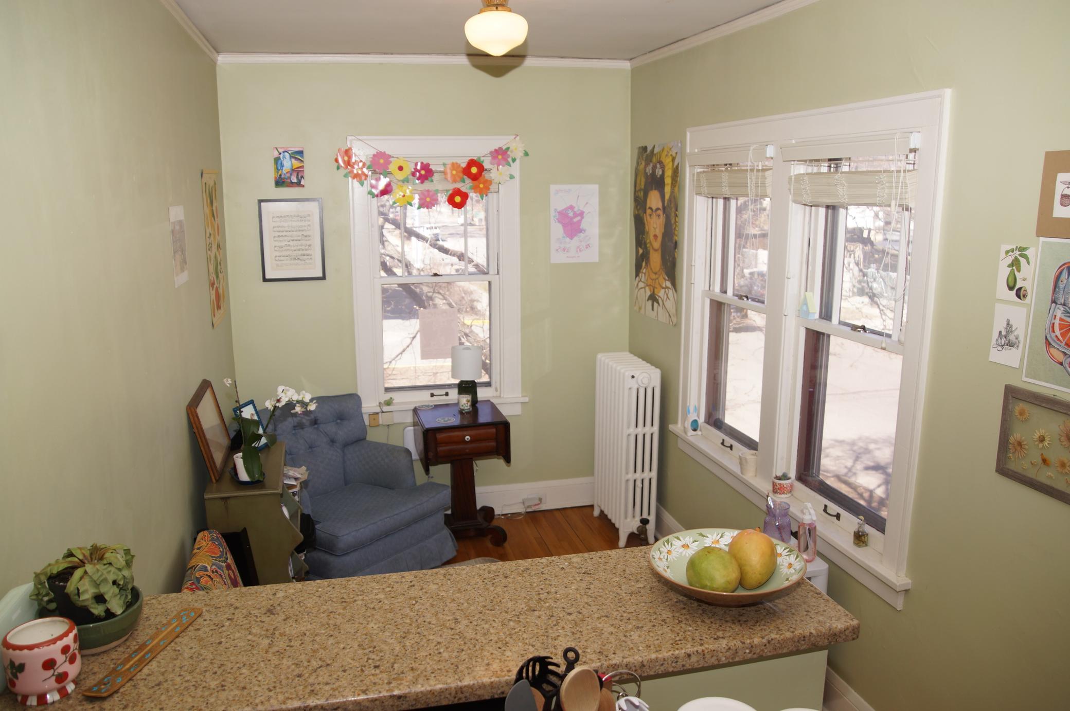 Breakfast Bar Area with Quartz Counter looking to Informal Dining.